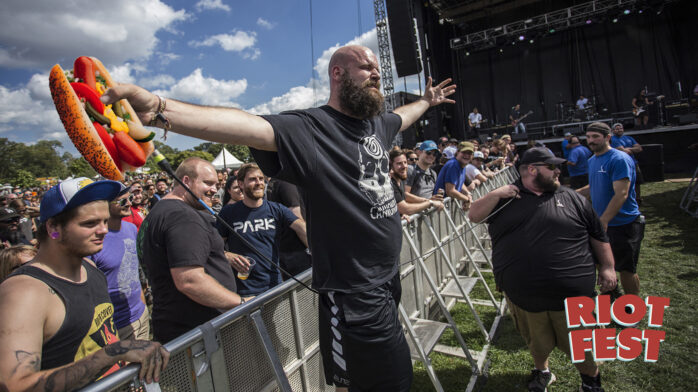 Musicians Enjoying Hot Dogs at Riot Fest