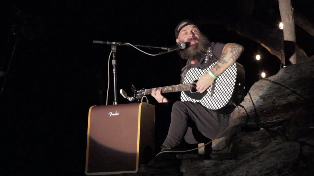 Tim Armstrong Climbs A Tree And Plays ‘Journey to the End of the East Bay’